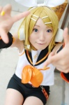 aka blonde_hair cosplay default_costume detached_sleeves hairbow headset kagamine_rin pantyhose sailor_uniform school_uniform shorts vocaloid rating:Safe score:0 user:nil!
