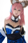 animal_ears caster cleavage collar cosplay detached_sleeves dress fate/extra fate/series fox_ears pink_hair seri yellow_eyes rating:Safe score:0 user:pixymisa