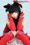 boots cosplay detached_sleeves dress fate/series fate/stay_night fingerless_gloves gloves hair_ribbons red_devil saku tohsaka_rin twintails rating:Safe score:3 user:nil!