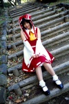 blouse cosplay detached_sleeves hairbow hakurei_reimu matsunaga_ayaka miko skirt socks touhou rating:Safe score:0 user:nil!