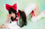 boots cosplay detached_sleeves hairbow hakurei_reimu handcuffs kneepads lenfried miko one-piece_swimsuit swimsuit thighhighs touhou rating:Safe score:0 user:nil!
