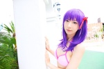 bikini bikini_top cleavage cosplay fate/series fate/stay_night hair_ribbons matou_sakura purple_hair sachi_budou side-tie_bikini swimsuit rating:Safe score:0 user:nil!