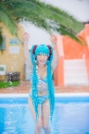 aqua_hair bikini cleavage cosplay hatsune_miku headset mashiro_yuki pool project_diva swimsuit twintails vocaloid wet rating:Safe score:0 user:nil!