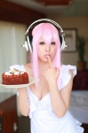 apron arai_yomi cake cleavage cosplay headphones nearly_naked_apron nitro_super_sonic pink_hair soniko_nuija_imashita super_soniko rating:Safe score:0 user:nil!
