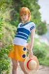 cosplay kuuya miniskirt nami_(one_piece) one_piece orange_hair skirt straw_hat tshirt rating:Safe score:1 user:nil!