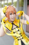 cosplay double_bun fingerless_gloves gloves hoshizora_rin kokou_ichika love_live!_school_idol_project miniskirt orange_hair skirt vest rating:Safe score:0 user:nil!