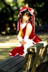 blouse cosplay detached_sleeves hairbow hakurei_reimu matsunaga_ayaka miko skirt touhou rating:Safe score:0 user:nil!