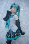 aqua_eyes aqua_hair blouse cosplay detached_sleeves hatsune_miku headphones miki pleated_skirt skirt thighhighs tie twintails vocaloid rating:Safe score:0 user:pixymisa