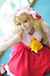 blonde_hair blouse cosplay flandre_scarlet hat kirino_naoki skirt socks touhou vest rating:Safe score:0 user:nil!