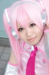 blouse cosplay detached_sleeves hatsune_miku headset nukokan pink_hair tie twintails vocaloid rating:Safe score:0 user:pixymisa
