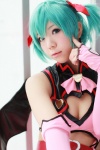 aqua_hair cleavage cosplay dress elbow_gloves fingerless_gloves gloves hair_ribbons hatsune_miku keyholes kousaka_yun project_diva sleeveless twintails vocaloid wings world_is_mine_(vocaloid) rating:Safe score:2 user:pixymisa