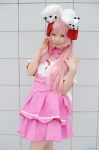 animal_ears bunny_ears cosplay di_gi_charat dress hairbows pink_hair seino_merika twintails usada_hikaru rating:Safe score:0 user:nil!