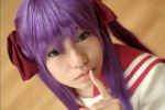 cosplay hair_ribbons hiiragi_kagami lucky_star naito purple_hair sailor_uniform school_uniform socks twintails rating:Safe score:1 user:darkgray