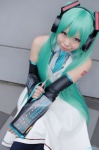 apron aqua_hair cosplay detached_sleeves hatsune_miku headset mizuhara_akio pleated_skirt skirt sweater_vest tagme_song thighhighs tie twintails vocaloid whisk rating:Safe score:1 user:nil!