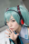 aqua_hair blouse cosplay detached_sleeves hatsune_miku headset maitako tie twintails vocaloid rating:Safe score:0 user:pixymisa