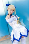 blonde_hair blue_eyes cosplay dress elbow_gloves fate/series fate/stay_night gloves hairbow pettipants rinami saber slip sword thighhighs zettai_ryouiki rating:Safe score:1 user:pixymisa