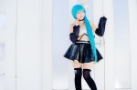 aqua_hair black_legwear cosplay croptop detached_sleeves hairbow hatsune_miku mashiro_yuki pleated_skirt ponytail project_diva skirt thighhighs vocaloid zettai_ryouiki rating:Safe score:0 user:nil!