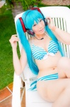 aqua_hair bikini cleavage cosplay hatsune_miku headset mashiro_yuki pool project_diva swimsuit twintails vocaloid rating:Safe score:2 user:nil!