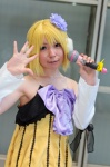 azumi_(iii) bow cosplay detached_sleeves dress ear_muffs flower grey_eyes kagamine_rin microphone vocaloid yellow_hair rating:Safe score:0 user:pixymisa