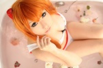 bathroom bathtub bikini cleavage cosplay hair_pods neon_genesis_evangelion red_hair red_solitude_type_two saku soryu_asuka_langley swimsuit twintails wet rating:Safe score:2 user:nil!