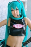 aira aqua_hair cosplay croptop elbow_gloves gloves hatsune_miku headset project_diva shorts sleeveless twintails vocaloid rating:Safe score:1 user:nil!