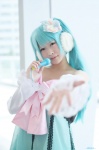 aqua_hair cosplay detached_sleeves dress hatsune_miku microphone tagme_song twintails uni vocaloid rating:Safe score:0 user:nil!