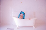 aqua_hair bathroom bathtub bikini_top cleavage cosplay hatsune_miku headset mashiro_yuki project_diva swimsuit twintails vocaloid rating:Safe score:0 user:nil!