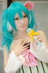 aqua_hair colorful_x_melody_(vocaloid) cosplay detached_sleeves dress hatsune_miku microphone project_diva saya twintails vocaloid rating:Safe score:1 user:nil!