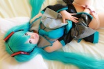 aqua_hair arai_yomi bed blouse cosplay detached_sleeves hatsune_miku headset panties pleated_skirt skirt tie twintails vocaloid rating:Safe score:5 user:nil!