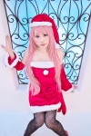 black_legwear cosplay dai detached_sleeves megurine_luka pantyhose pink_hair santa_costume stocking_cap vocaloid rating:Safe score:0 user:pixymisa
