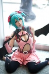 aqua_hair cleavage cosplay dress elbow_gloves fingerless_gloves gloves hatsune_miku headset leggings project_diva ryuga tail vocaloid wings world_is_mine_(vocaloid) rating:Safe score:3 user:nil!