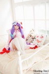 bed cosplay dress hat patchouli_knowledge purple_hair robe saku sweet_garden thighhighs touhou zettai_ryouiki rating:Safe score:0 user:nil!