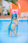 aqua_hair bikini cleavage cosplay hatsune_miku headset mashiro_yuki pool project_diva swimsuit twintails vocaloid wet rating:Safe score:2 user:nil!