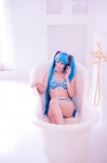 aqua_hair bathroom bathtub bikini cleavage cosplay hatsune_miku headset mashiro_yuki project_diva swimsuit twintails vocaloid rating:Safe score:0 user:nil!