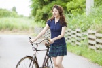 bicycle campus_lover kimura_konomi pleated_skirt polo skirt twintails rating:Safe score:1 user:nil!