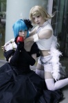 aqua_hair blonde_hair chains choker cosplay elbow_gloves fingerless_gloves gloves gown hatsune_miku himitsu_~kuro_no_chikai~_(vocaloid) kagamine_rin kana_(ii) shorts sleeveless_blouse thighhighs vocaloid wings yuyu_kaname rating:Safe score:0 user:nil!