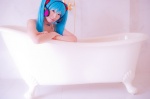 aqua_hair bathroom bathtub bikini_top cosplay hatsune_miku headset mashiro_yuki project_diva swimsuit twintails vocaloid rating:Safe score:0 user:nil!