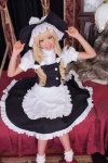apron bed blonde_hair cosplay dress kirisame_marisa love_saotome skirt socks touhou vest witch_hat rating:Safe score:1 user:nil!