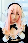 apron cleavage cosplay crossover_tie headband headphones maid maid_uniform nitro_super_sonic pink_hair super_soniko yukimi rating:Safe score:0 user:pixymisa