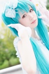 aqua_hair cosplay flowers gloves hairbow hatsune_miku kii_anzu lingerie necklace twintails vocaloid rating:Safe score:0 user:pixymisa