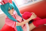 aqua_hair choker cosplay hatsune_miku momo_hana nurse nurse_cap nurse_uniform pantyhose thighhighs twintails vocaloid zettai_ryouiki rating:Safe score:3 user:pixymisa