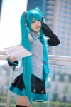 aqua_hair ayaki blouse cosplay detached_sleeves hatsune_miku headset pleated_skirt skirt thighhighs tie twintails vocaloid zettai_ryouiki rating:Safe score:2 user:nil!