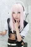 choker cosplay garter_belt headphones jacket nakko nitro_super_sonic panties pink_eyes pink_hair shorts super_soniko tubetop rating:Safe score:1 user:pixymisa