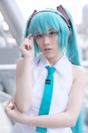 aqua_hair cosplay glasses hatsune_miku headset popuri sleeveless_blouse tie twintails vocaloid rating:Safe score:0 user:nil!