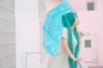 aqua_eyes aqua_hair blouse cosplay hatsune_miku twintails umbrella vocaloid wristband yuuki_mio rating:Safe score:0 user:pixymisa