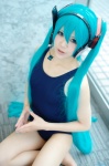 aqua_hair cosplay hatsune_miku headset one-piece_swimsuit pantyhose swimsuit twintails utateika-na vocaloid rating:Safe score:1 user:nil!