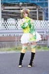 boots cosplay detached_sleeves double_bun koizumi_hanayo love_live!_school_idol_project miniskirt shiratama_gabu skirt thighhighs vest yellow_legwear zettai_ryouiki rating:Safe score:0 user:nil!