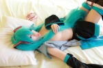 aqua_hair arai_yomi bed blouse cosplay detached_sleeves hatsune_miku headset open_clothes panties pleated_skirt skirt thighhighs tie twintails vocaloid rating:Safe score:4 user:nil!