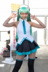 aqua_hair cosplay glasses hatsune_miku headphones necoco pantyhose pleated_skirt skirt sleeveless_blouse thighhighs tie twintails vocaloid zettai_ryouiki rating:Safe score:0 user:pixymisa