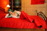 bed blouse cleavage cosplay green_hair morrigan_aensland open_clothes otomaru trousers vampire_(game) rating:Safe score:1 user:nil!